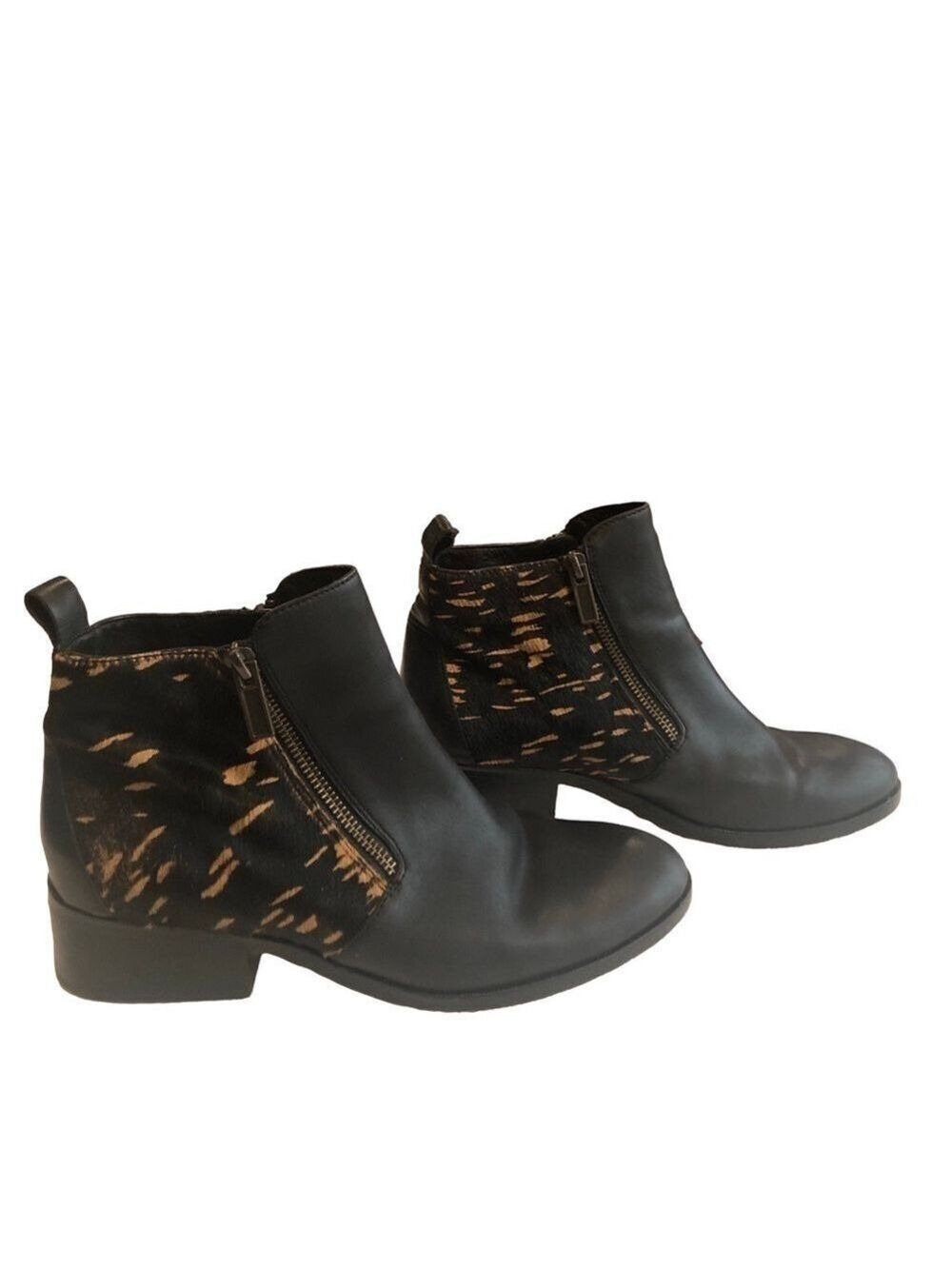 Cole Haan Size 9 leather and animal hair black ankle bootie.